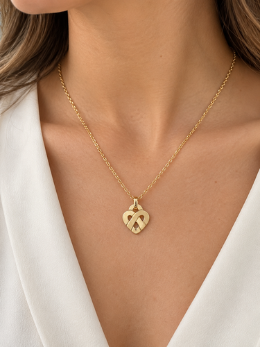 Poiray Entrelacé - Collier pendentif cœur en or jaune 58 Facettes 33826