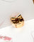 Bague 53 Bague « Tank Nœud » 1940 en or rose et blanc 750, rubis Verneuil et diamant 58 Facettes A12238