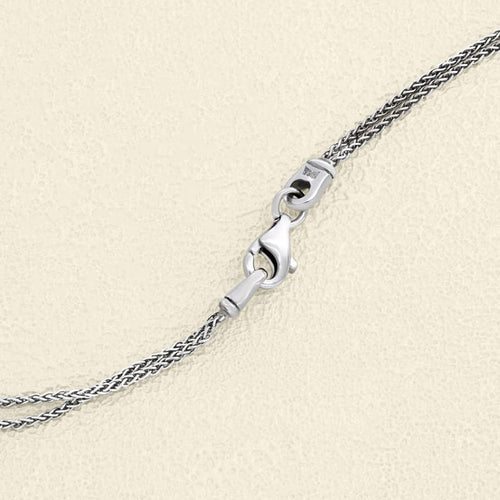 Pendentif croix souple en or blanc et diamants 58 Facettes OC-64600023