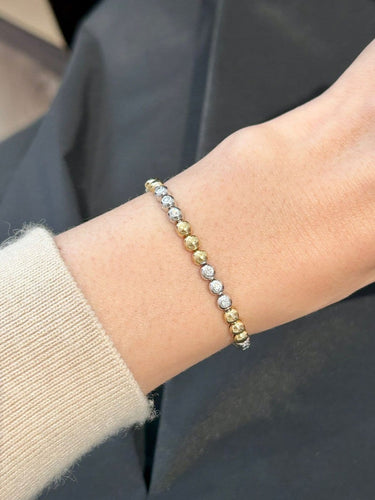 Bracelet en or jaune et or blanc 18K et diamants 58 Facettes 280