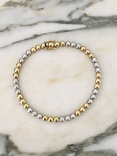Bracelet en or jaune et or blanc 18K et diamants 58 Facettes 280