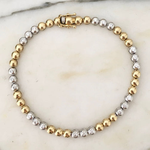 Bracelet en or jaune et or blanc 18K et diamants 58 Facettes 280