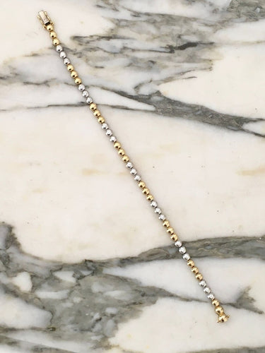 Bracelet en or jaune et or blanc 18K et diamants 58 Facettes 280