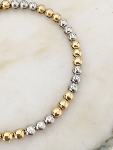 Bracelet en or jaune et or blanc 18K et diamants 58 Facettes 280