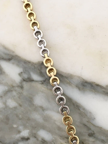 Bracelet en or jaune et or blanc 18K et diamants 58 Facettes 280