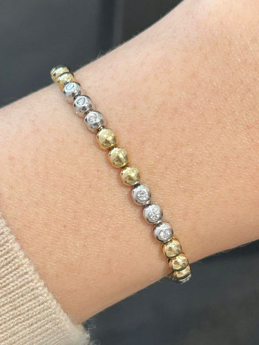 Bracelet en or jaune et or blanc 18K et diamants 58 Facettes 280