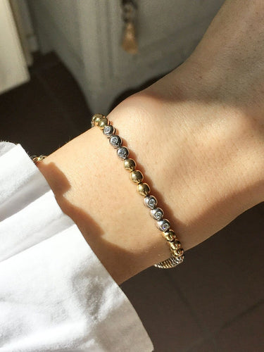 Bracelet en or jaune et or blanc 18K et diamants 58 Facettes 280