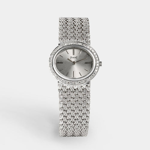Piaget - Montre vintage en or blanc et diamants 58 Facettes 249