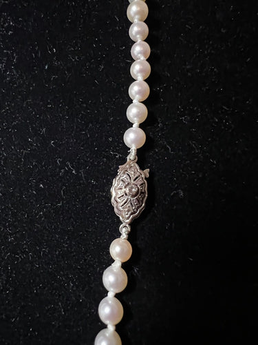 Collier en chute 71 perles de culture, fermoir en or 18K diamant 58 Facettes 936