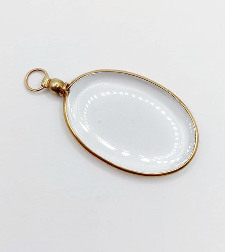 Pendentif porte-photo ovale en or 18k 58 Facettes A07700