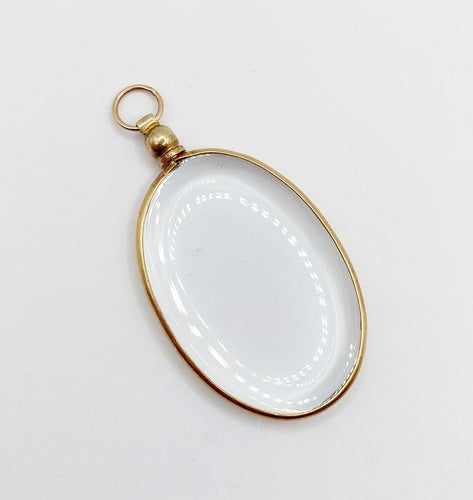 Pendentif porte-photo ovale en or 18k 58 Facettes A07700