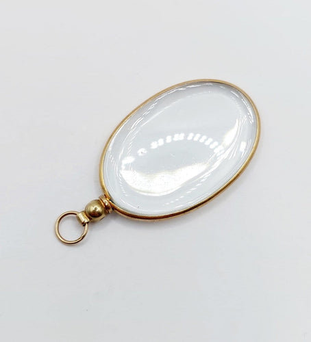 Pendentif porte-photo ovale en or 18k 58 Facettes A07700