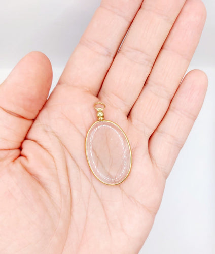 Pendentif porte-photo ovale en or 18k 58 Facettes A07700