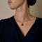 Art déco - Pendentif en or jaune et blanc, onyx et diamants 58 Facettes B260456