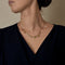 Collier palmettes en or jaune et argent 58 Facettes B260488