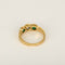 52 Bague jonc en or jaune, diamant et émeraudes 58 Facettes B260398