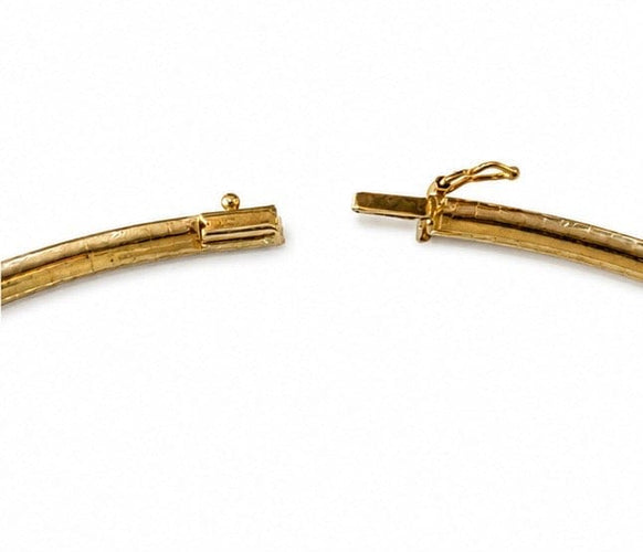 Collier torque en or jaune 18 carats 58 Facettes C184