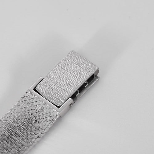 Baume & Mercier - Montre vintage en or blanc 58 Facettes 58FC57