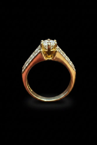 Bague 52 Bague solitaire 0,73 ct en or jaune 18K et diamants 58 Facettes