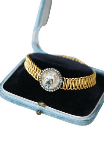Bracelet ancien fixé sous verre en or jaune et diamants