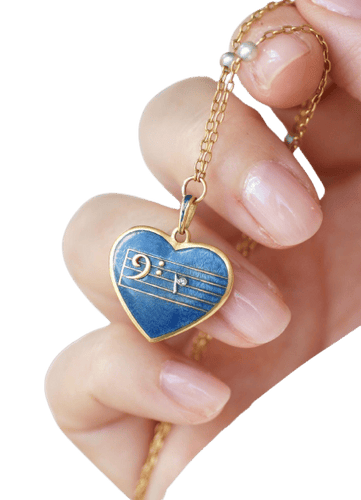 Collier pendentif cœur clé de fa en or jaune, perle et diamant