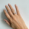 https://cdn.shopify.com/s/files/1/0943/8576/6747/files/bague-solitaire-diamant-or-blanc.webp?v=1789634689