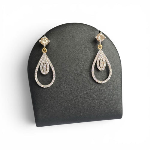 https://desbijouxenor.com/wp-content/uploads/2026/06/Boucles-doreilles-goutte-diamants-naturels-or-18-carats.jpg