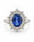 54 Bague marguerite en or blanc avec diamants et saphir de Ceylan 58 Facettes 91022
