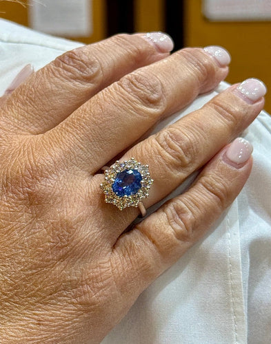 54 Bague marguerite en or blanc avec diamants et saphir de Ceylan 58 Facettes 91022