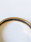 Hermès - Bracelet jonc Ballons et Cocardes en plaqué or et émail 58 Facettes 1320