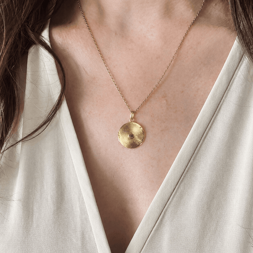 Pendentif médaillon ouvrant en or jaune guilloché 58 Facettes LMB-393