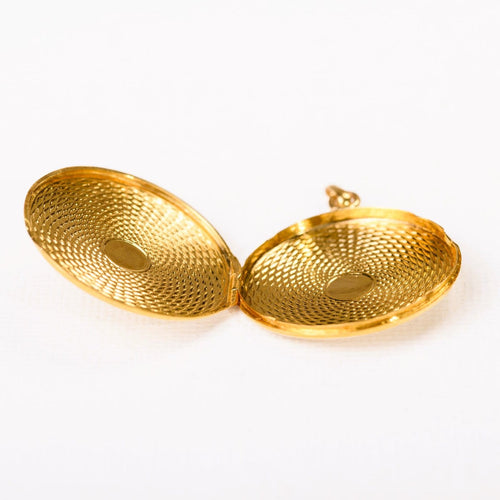 Pendentif médaillon ouvrant en or jaune guilloché 58 Facettes LMB-393