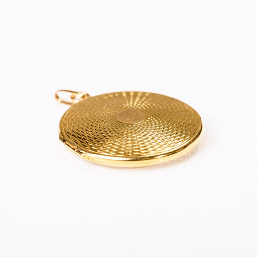 Pendentif médaillon ouvrant en or jaune guilloché 58 Facettes LMB-393