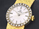 Omega - Montre mécanique en or 18 carats et diamants 58 Facettes 8034