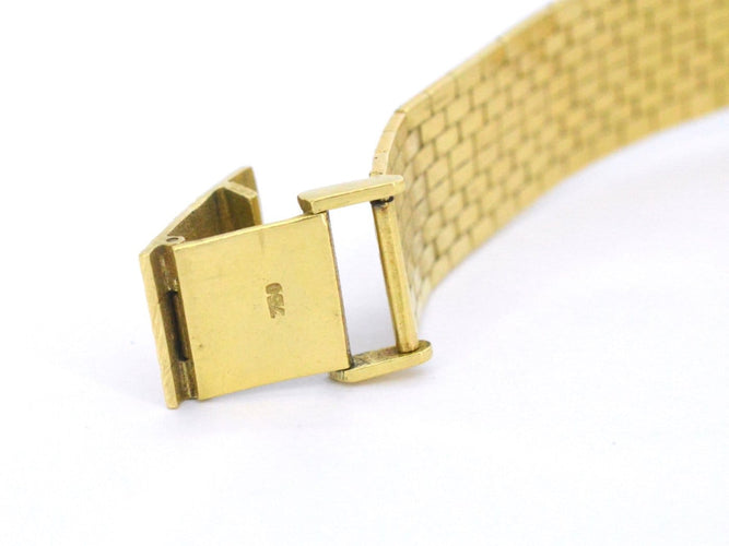 Omega - Montre mécanique en or 18 carats et diamants 58 Facettes 8034