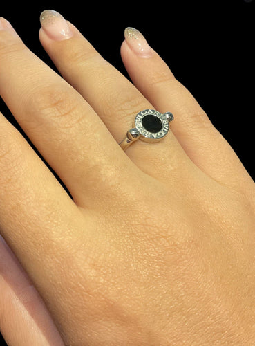 Bague 59 Bvlgari Bvlgari - Bague Flip en or blanc, diamants et onyx 58 Facettes