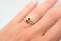 https://cdn.shopify.com/s/files/1/0963/7950/2920/files/bague-toi-et-moi-rubis-noir-carat-seconde-main_c27ede9c-453d-4a96-98c0-17c14e97bd31.webp?v=1789394283