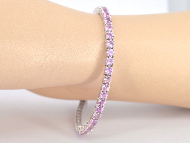 Bracelet tennis en or blanc et saphirs roses 58 Facettes 2902