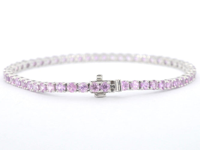 Bracelet tennis en or blanc et saphirs roses 58 Facettes 2902