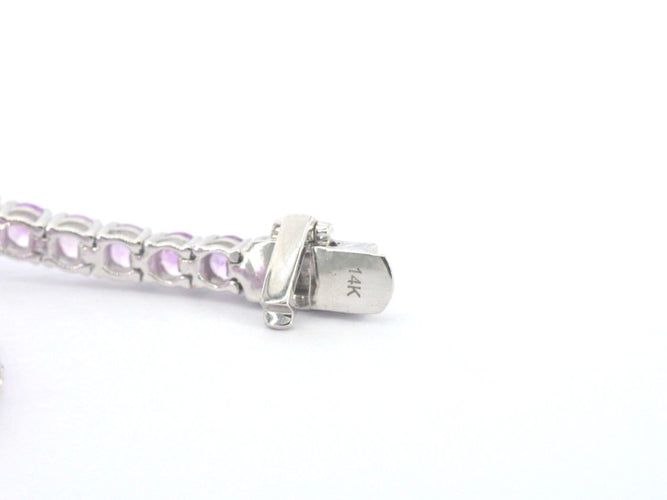 Bracelet tennis en or blanc et saphirs roses 58 Facettes 2902