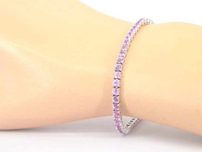 Bracelet tennis en or blanc et saphirs roses 58 Facettes 2903