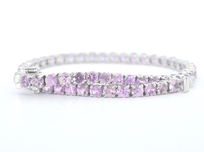 Bracelet tennis en or blanc et saphirs roses 58 Facettes 2903