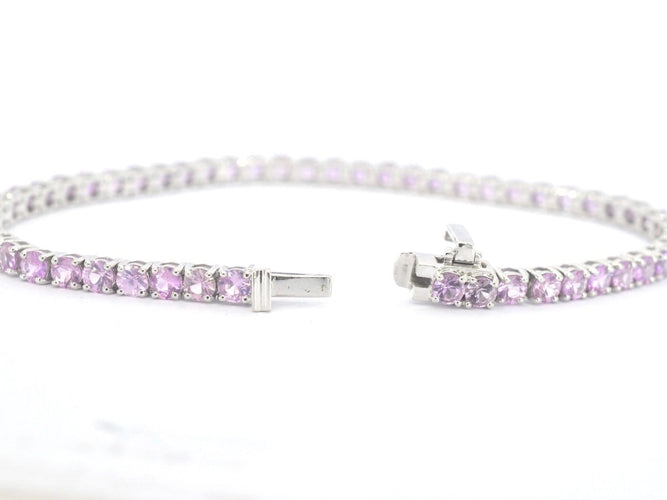 Bracelet tennis en or blanc et saphirs roses 58 Facettes 2903