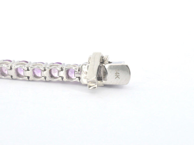Bracelet tennis en or blanc et saphirs roses 58 Facettes 2903