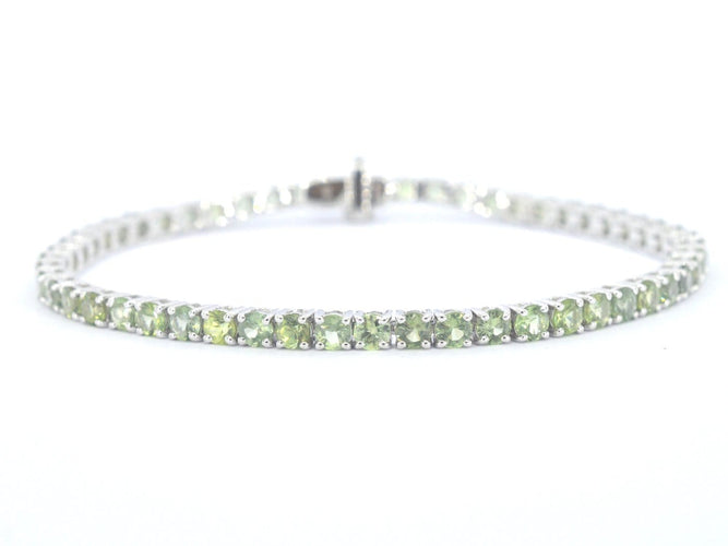 Bracelet tennis en or blanc et saphirs naturels 58 Facettes 2904