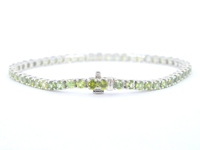 Bracelet tennis en or blanc et saphirs naturels 58 Facettes 2904