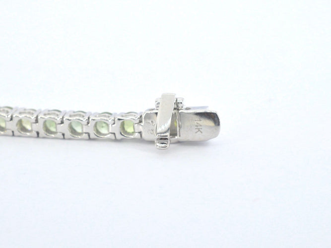 Bracelet tennis en or blanc et saphirs naturels 58 Facettes 2904