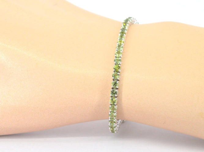 Bracelet tennis en or blanc et saphirs naturels 58 Facettes 2904