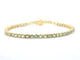 Bracelet tennis en or 14 carats et saphirs verts 58 Facettes 2905