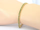 Bracelet tennis en or 14 carats et saphirs verts 58 Facettes 2905